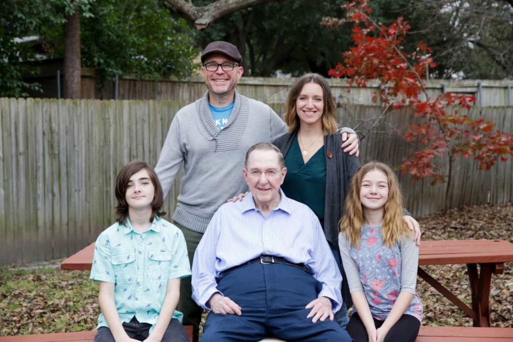 Stephanie with her husband two children and grandfather